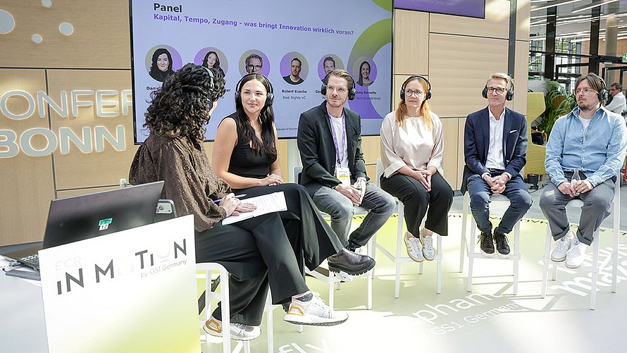 Eine Diskussion beim Startup Pitch bei ECR iN MOTiON 2026